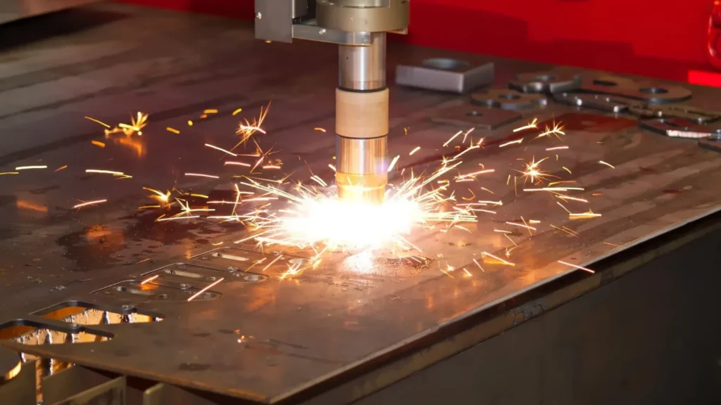 Plasma cutting process of metal using a high-temperature plasma arc.
