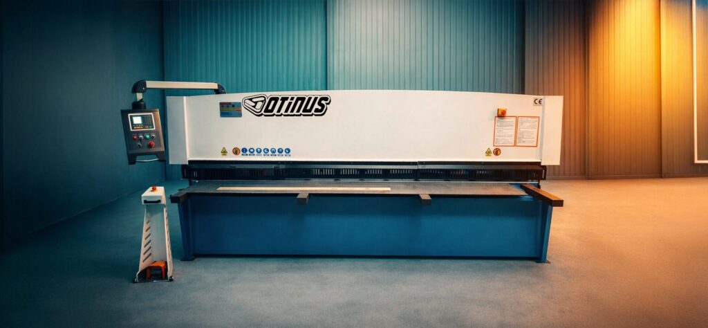 Otinus Base guillotine shears with a CNC control panel and CE certification, designed for precise sheet metal cutting in a modern and visually refined industrial environment.